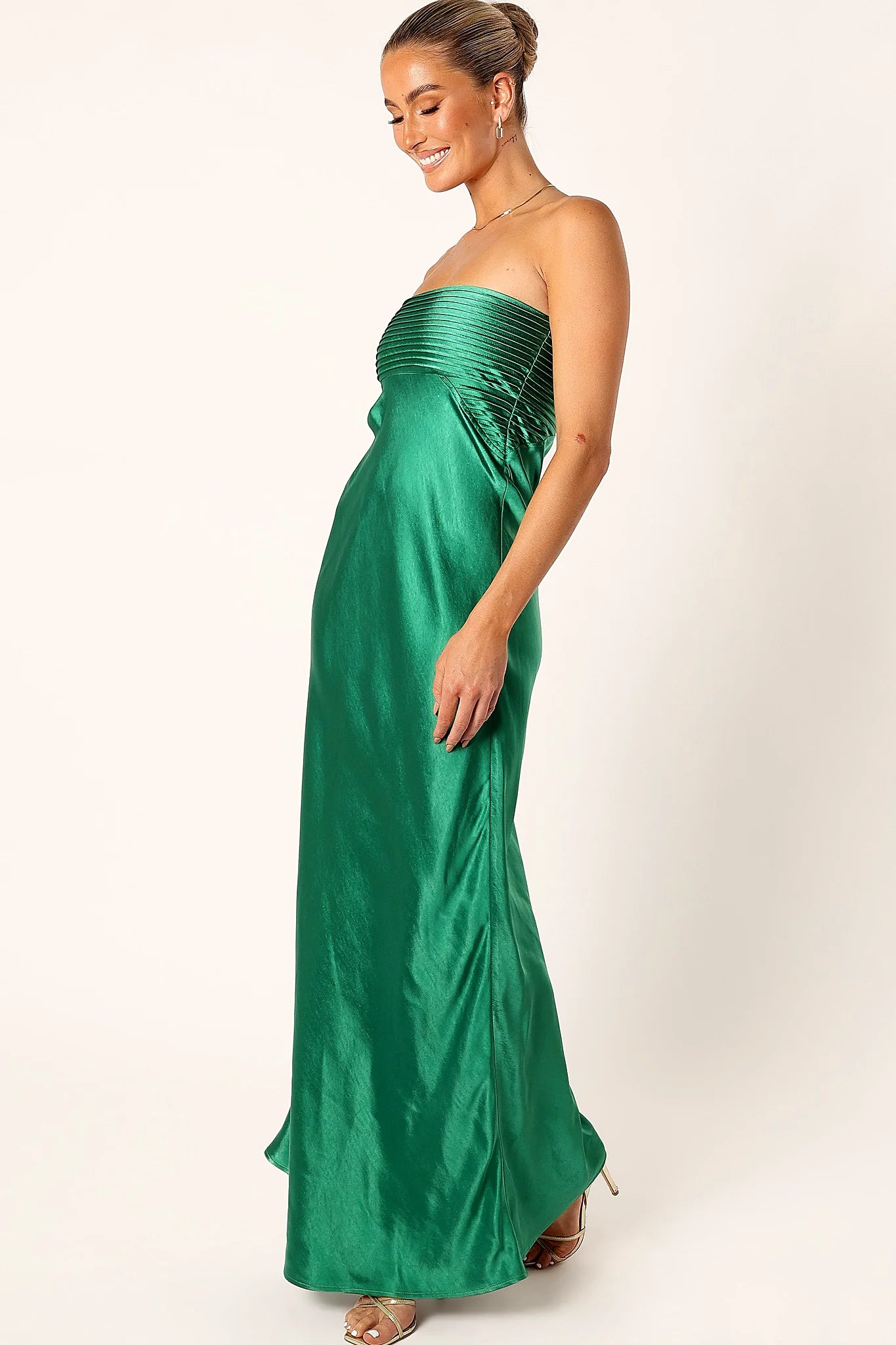 Full length view of an unlined emerald satin maxi dress