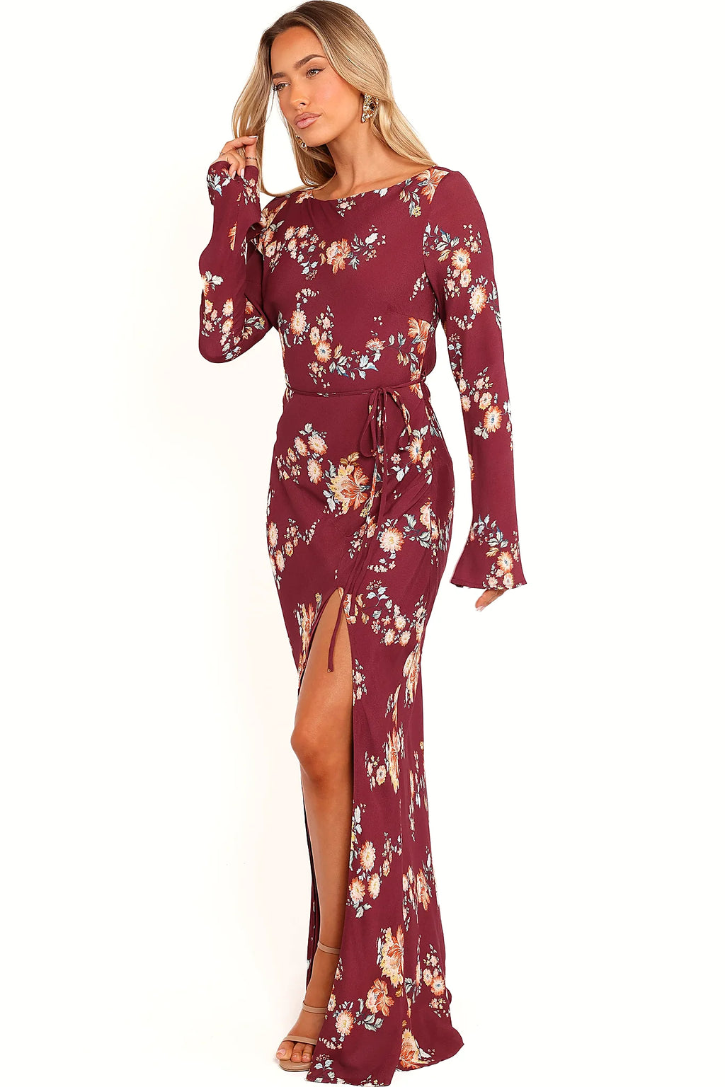 Full length view of a berry floral maxi dress with a front split