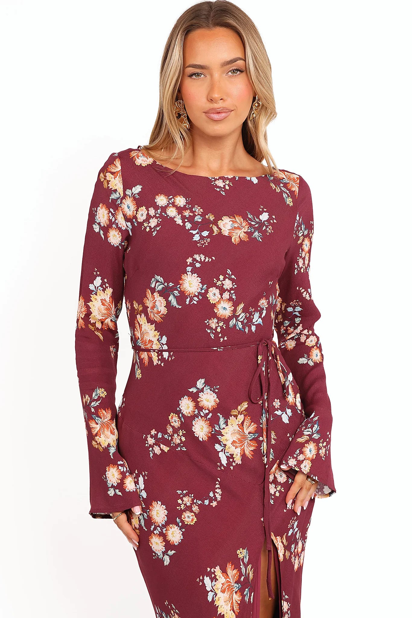 Belt loops with removable waist tie on a floral maxi dress