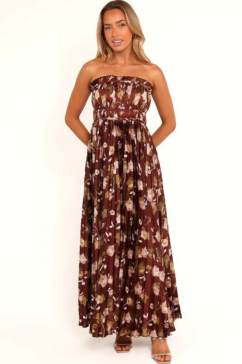 Fine pleats running through a brown floral maxi dress