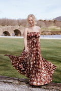 Brown floral strapless satin maxi dress with a straight neckline