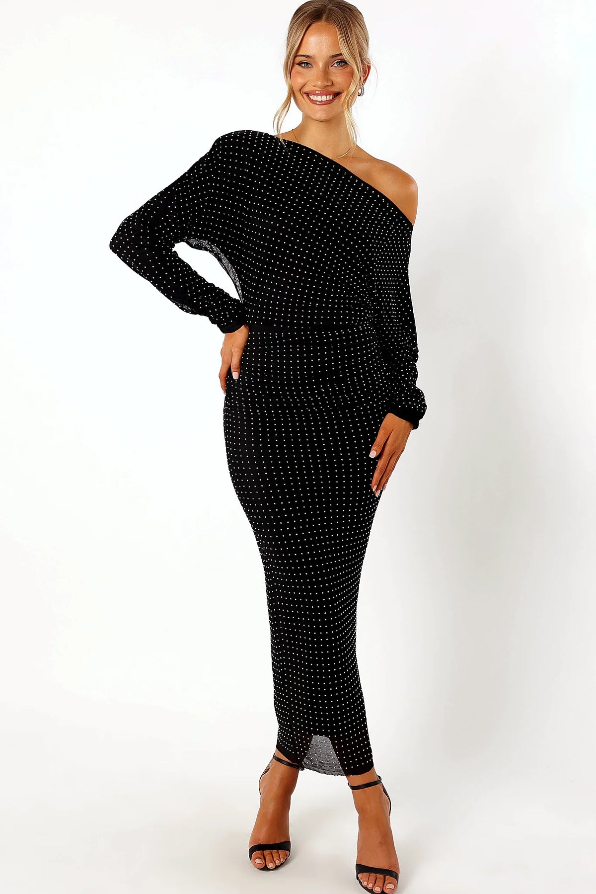 Black midi dress with embellished diamantes and an asymmetric neckline