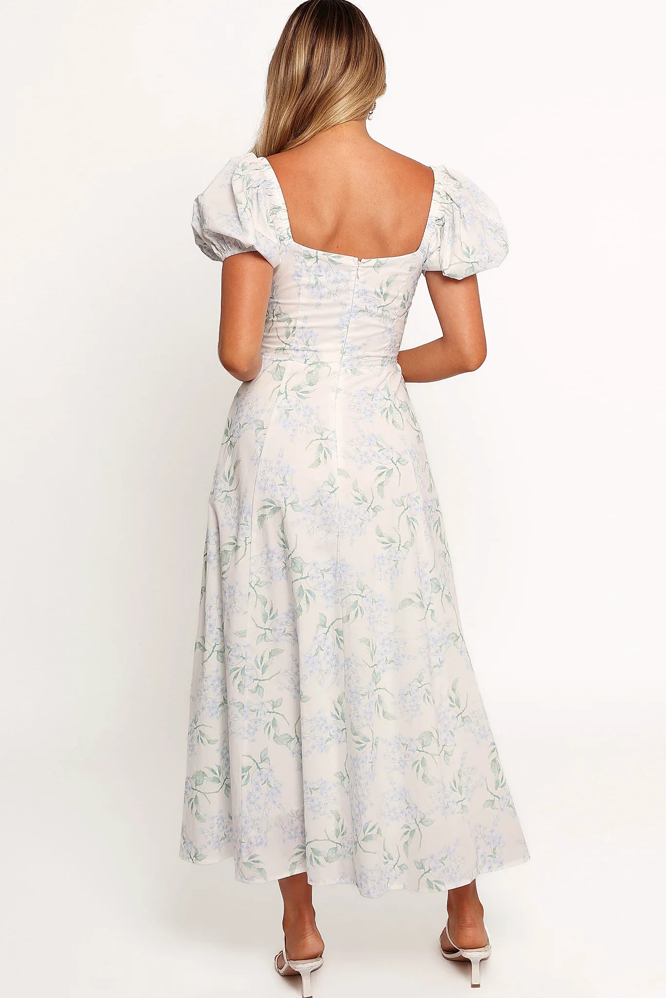 Full length view of a blue floral A-line midi dress