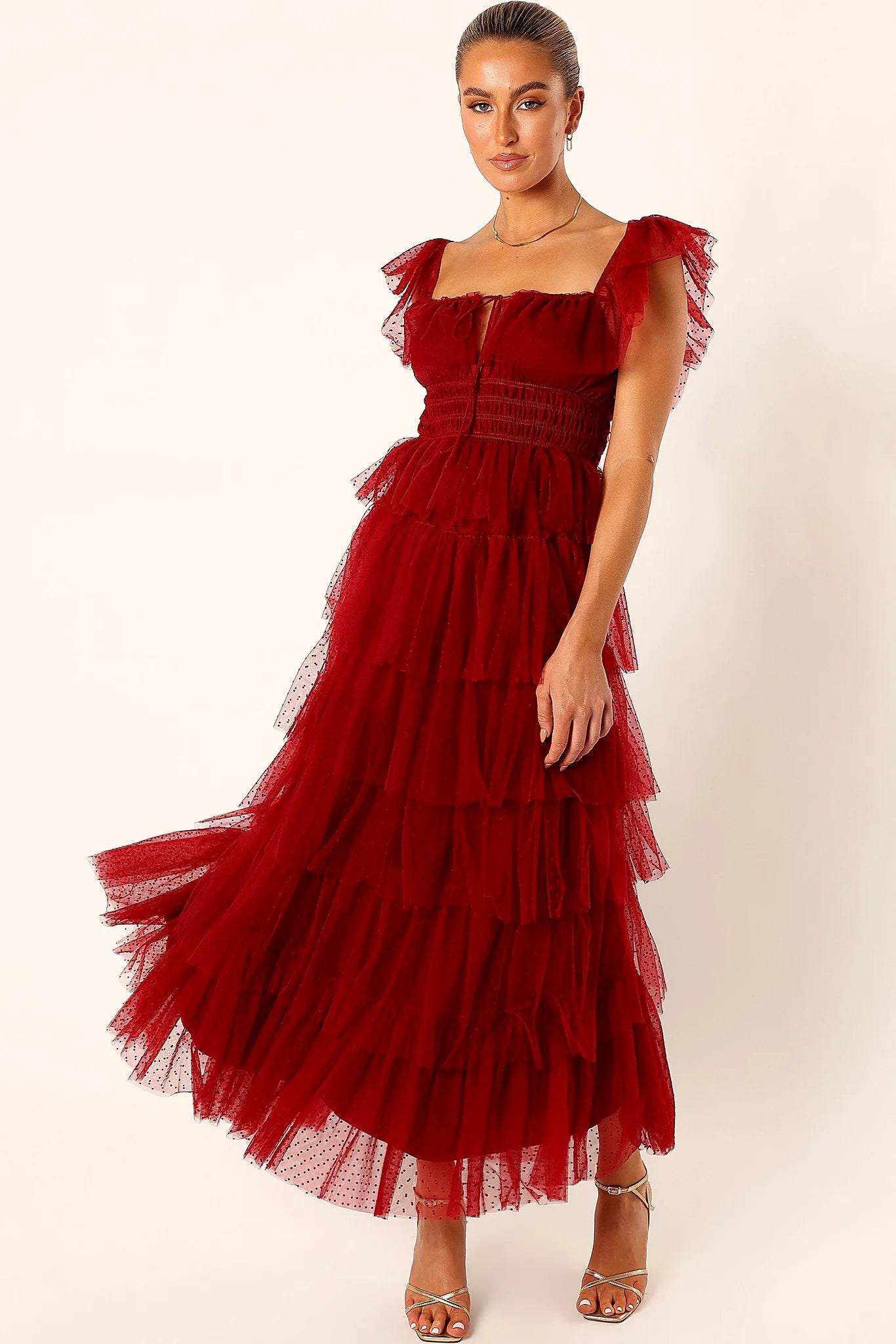 Burgundy tulle maxi dress with a square neckline and tie close