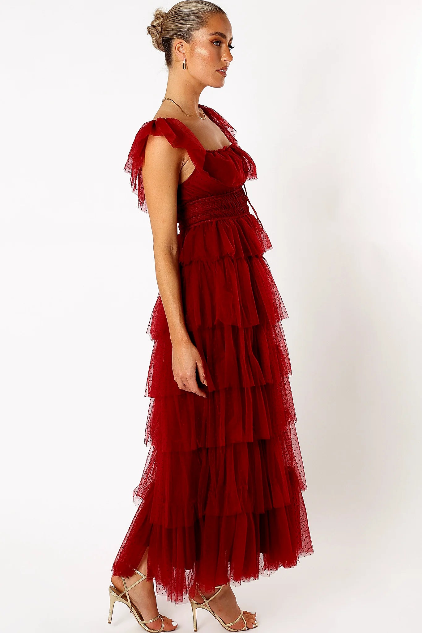 Thin elasticised straps with ruffle detail on a tulle maxi dress
