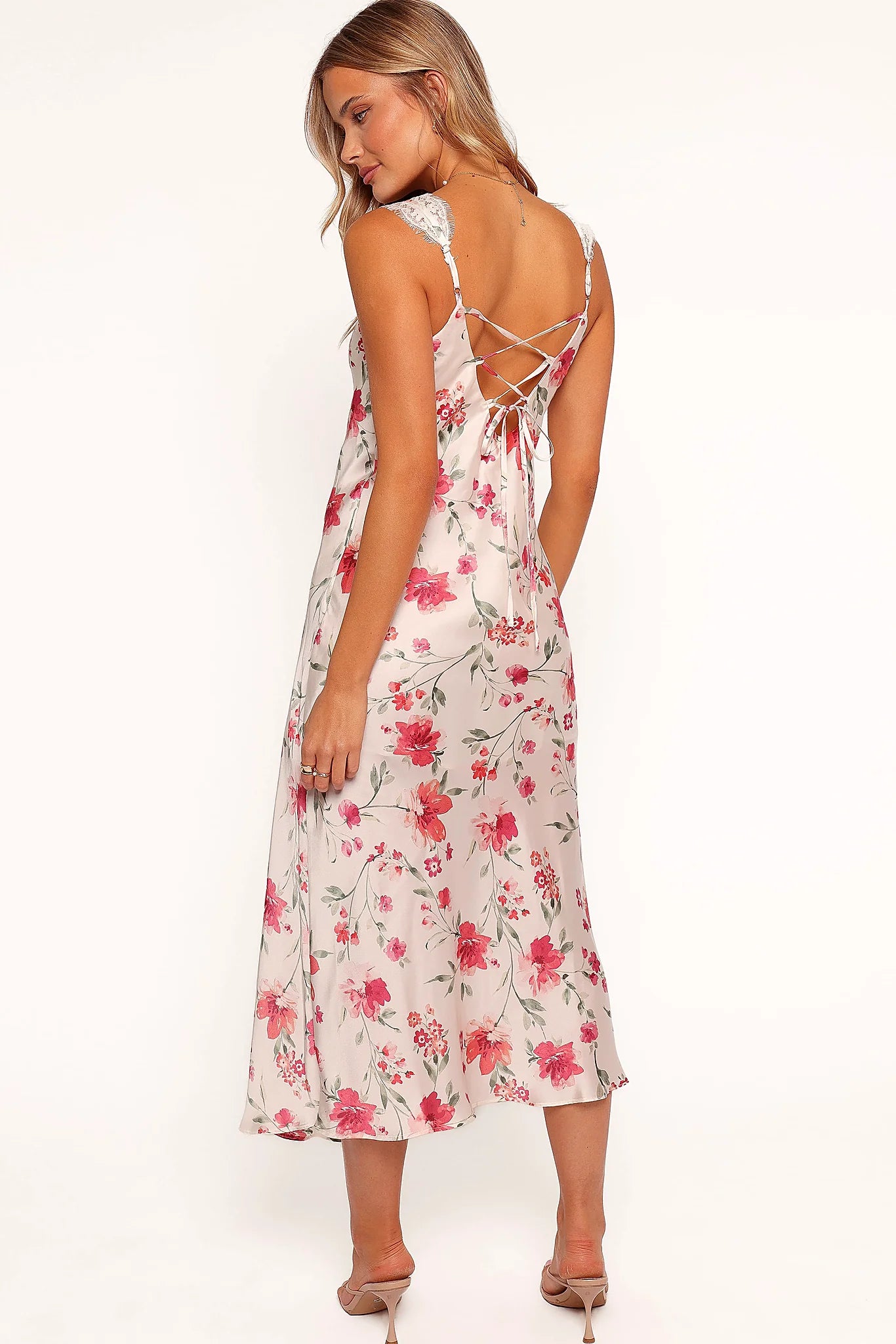 Full length view of a Cameo floral satin midi dress