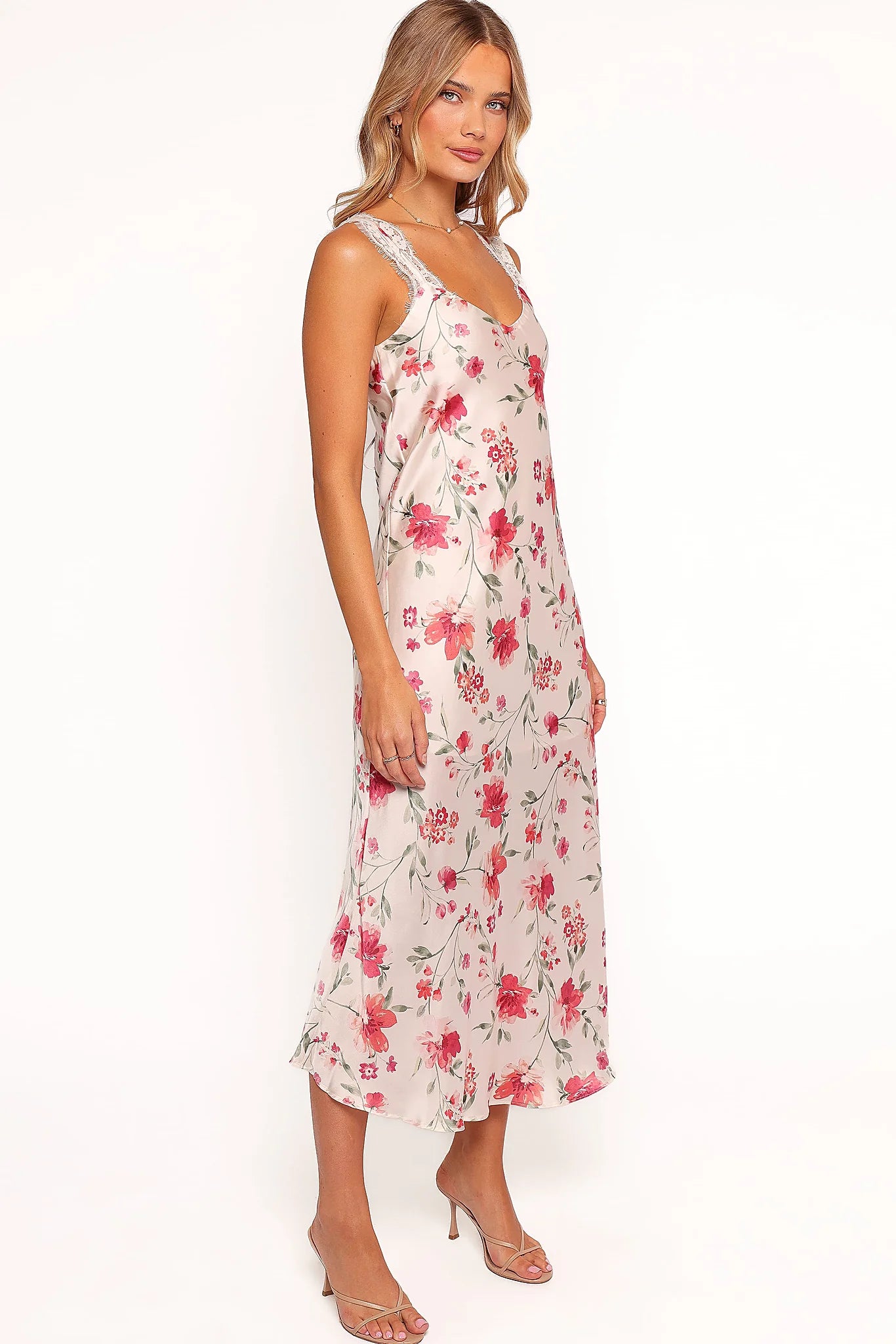 Corset tie close design at the back of a floral midi dress