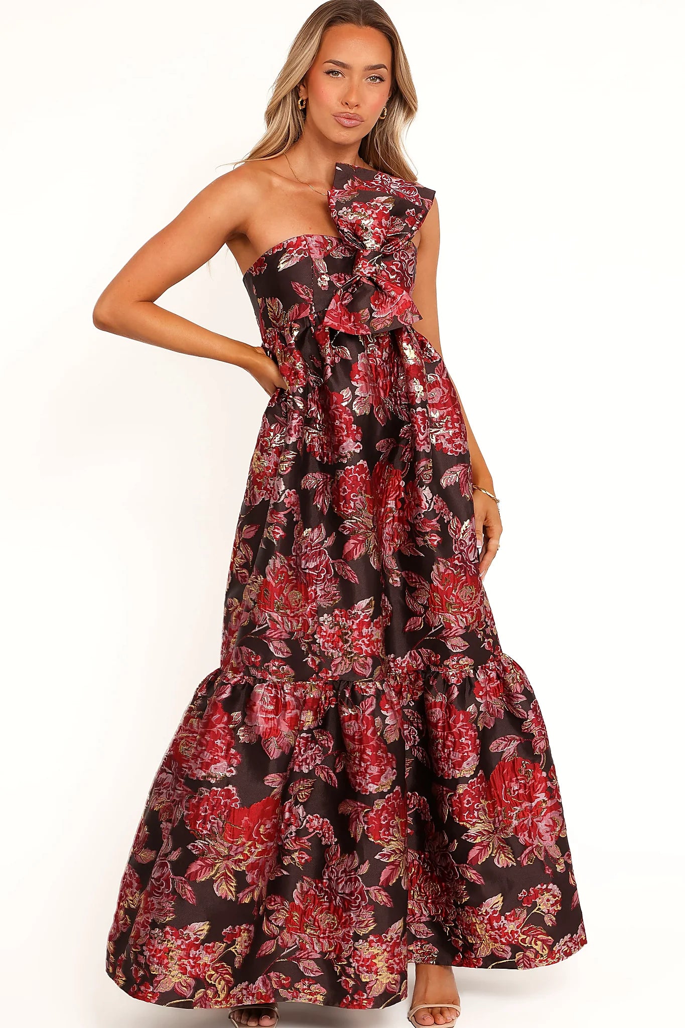 Adjustable shoulder strap on a brown floral maxi dress