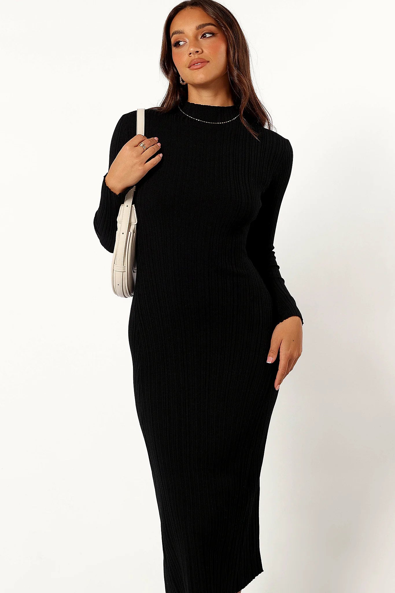 Frill hemline on an unlined black knit midi dress