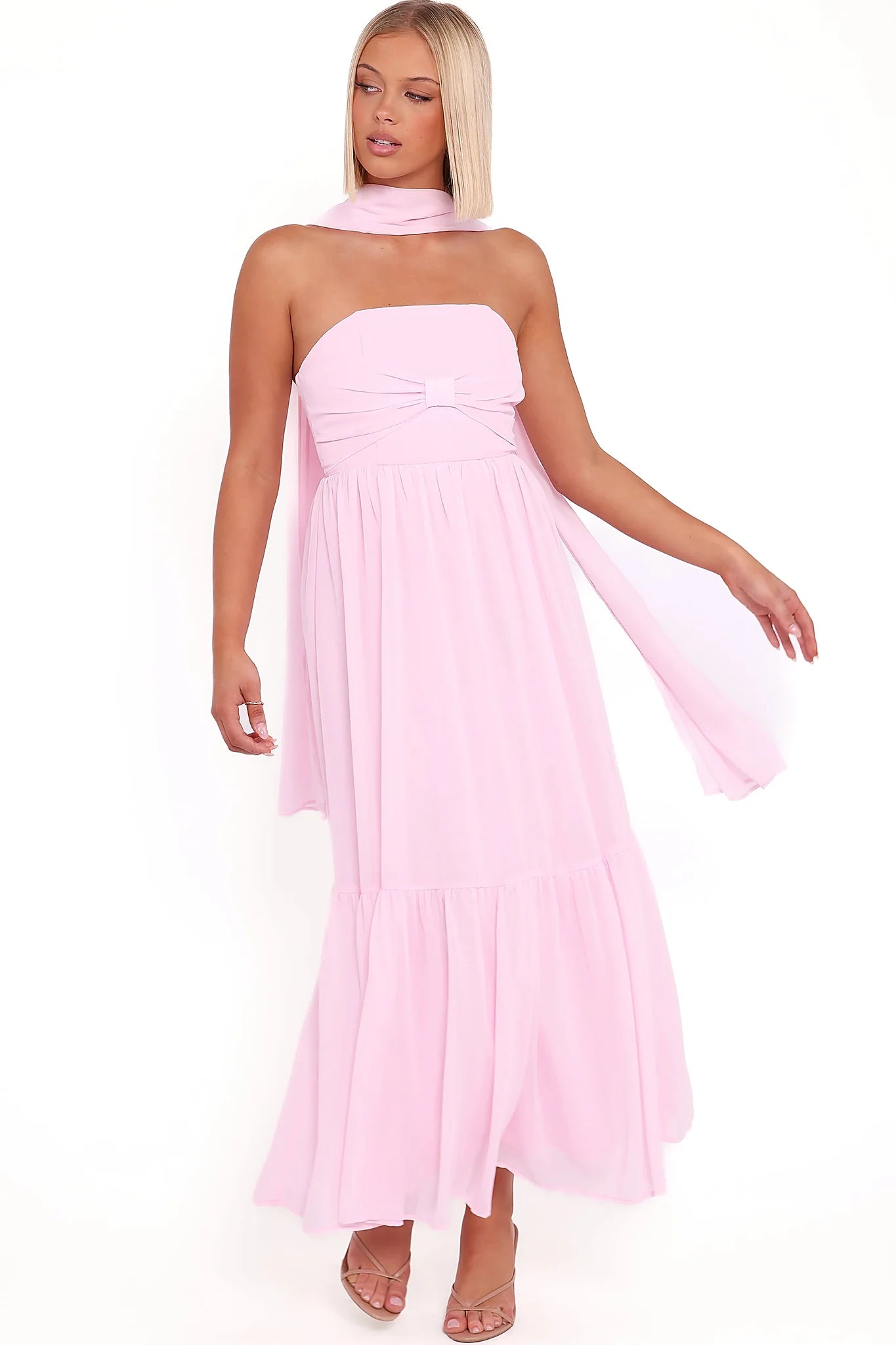 Pink maxi dress with a straight neckline and front bow feature