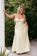 Yellow midi dress with a sweetheart neckline and thin tie straps
