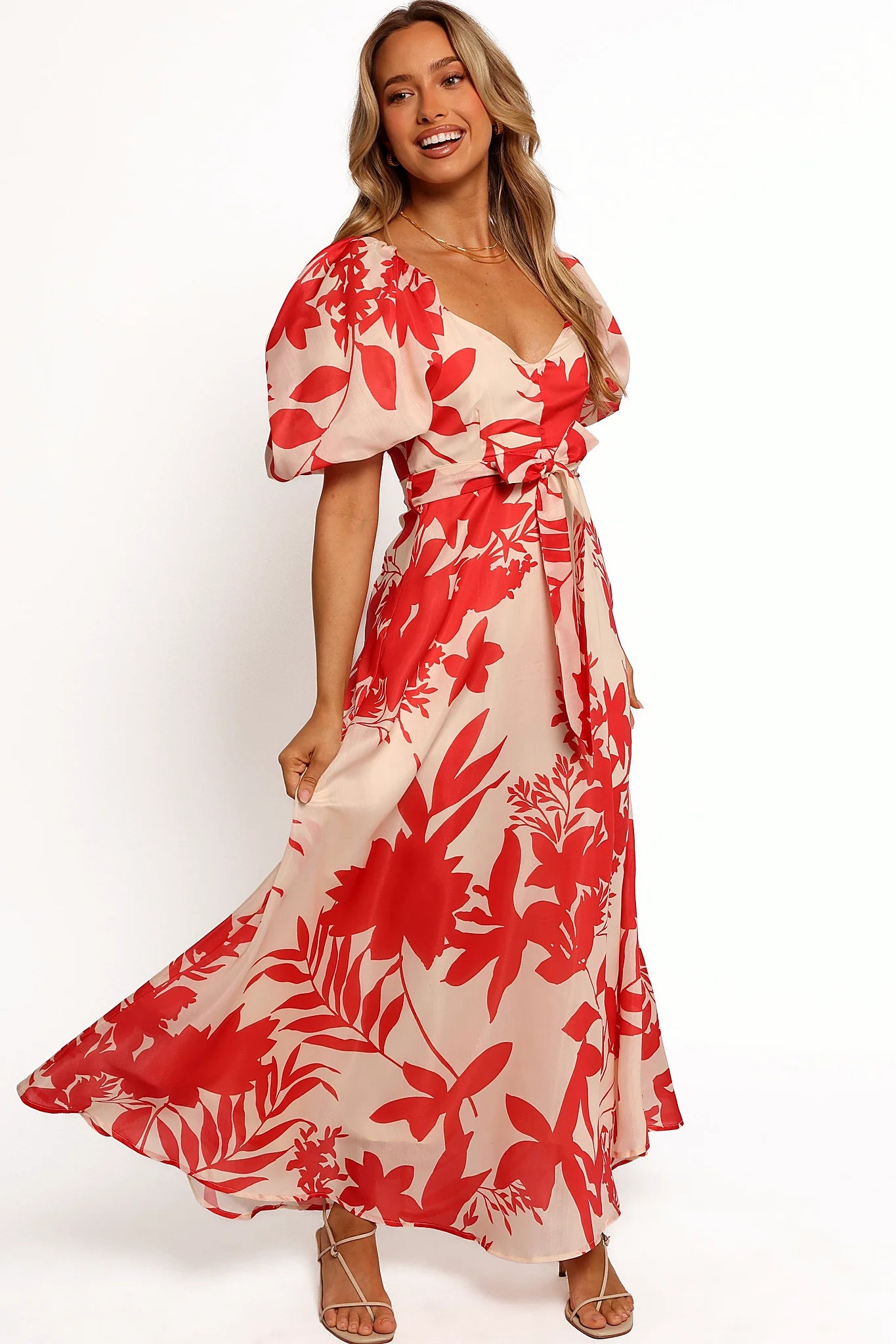 Belt loops with removable waist tie on a red floral midi dress