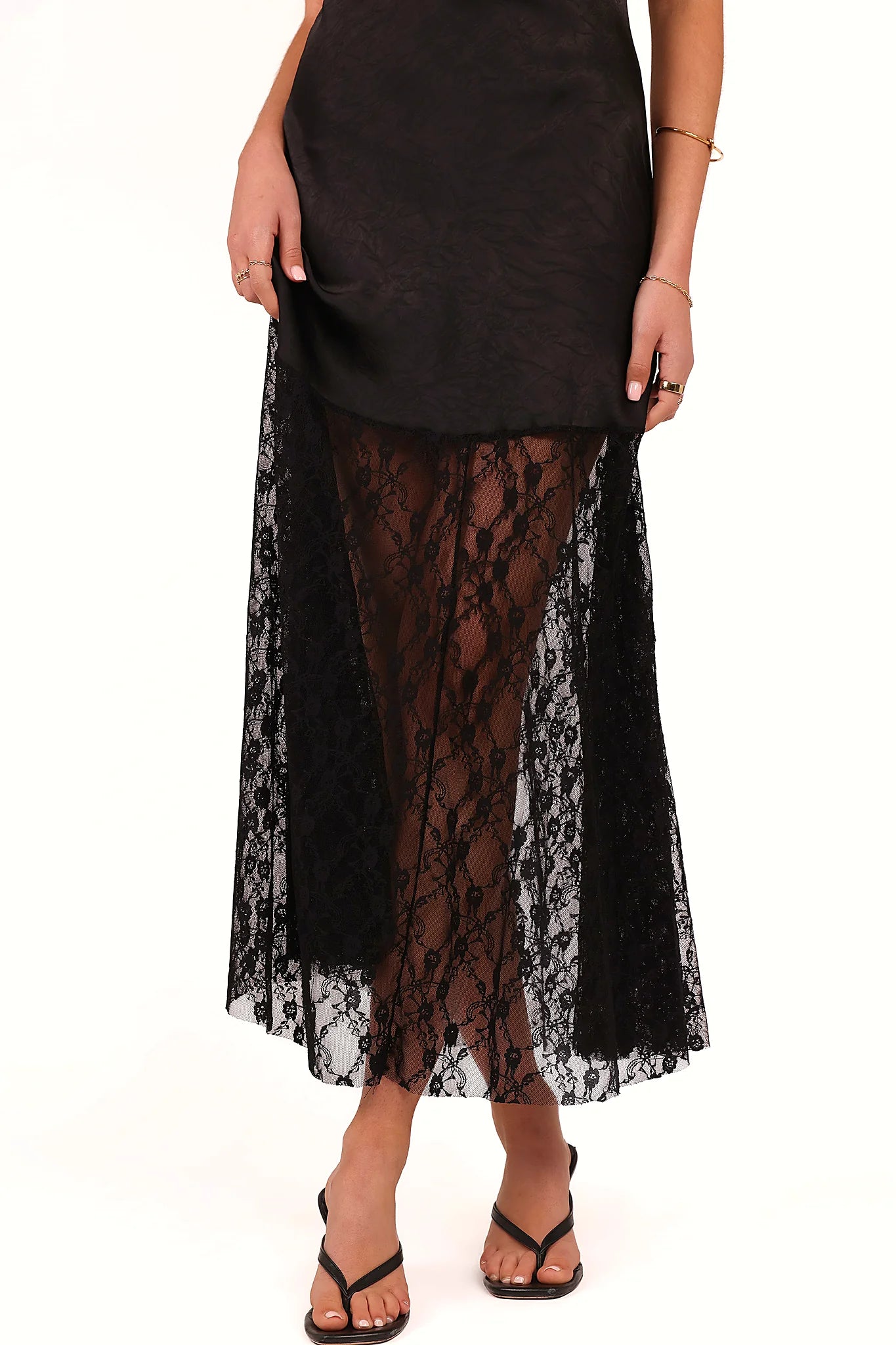 Contrast lace design on a black satin maxi dress
