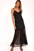 Black satin maxi dress with a V neckline and thin adjustable straps
