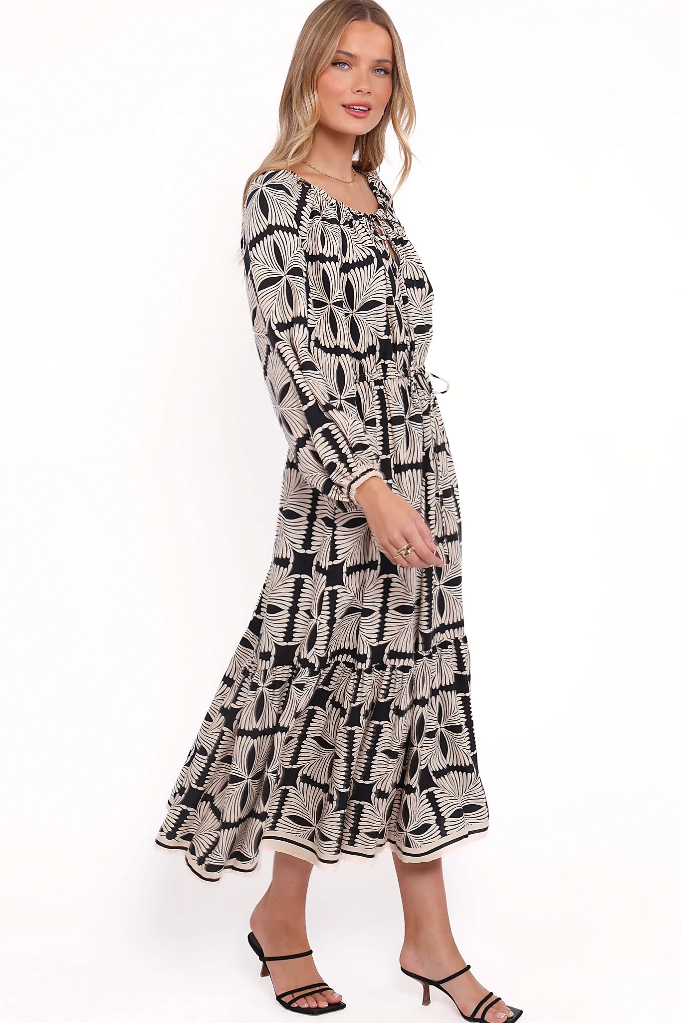 Drawstring waist tie close on an unlined black midi dress