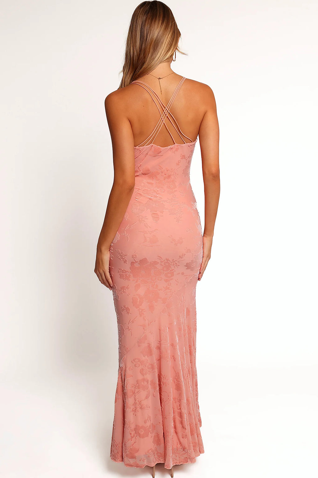 Full length view of a pink velvet bodycon maxi dress
