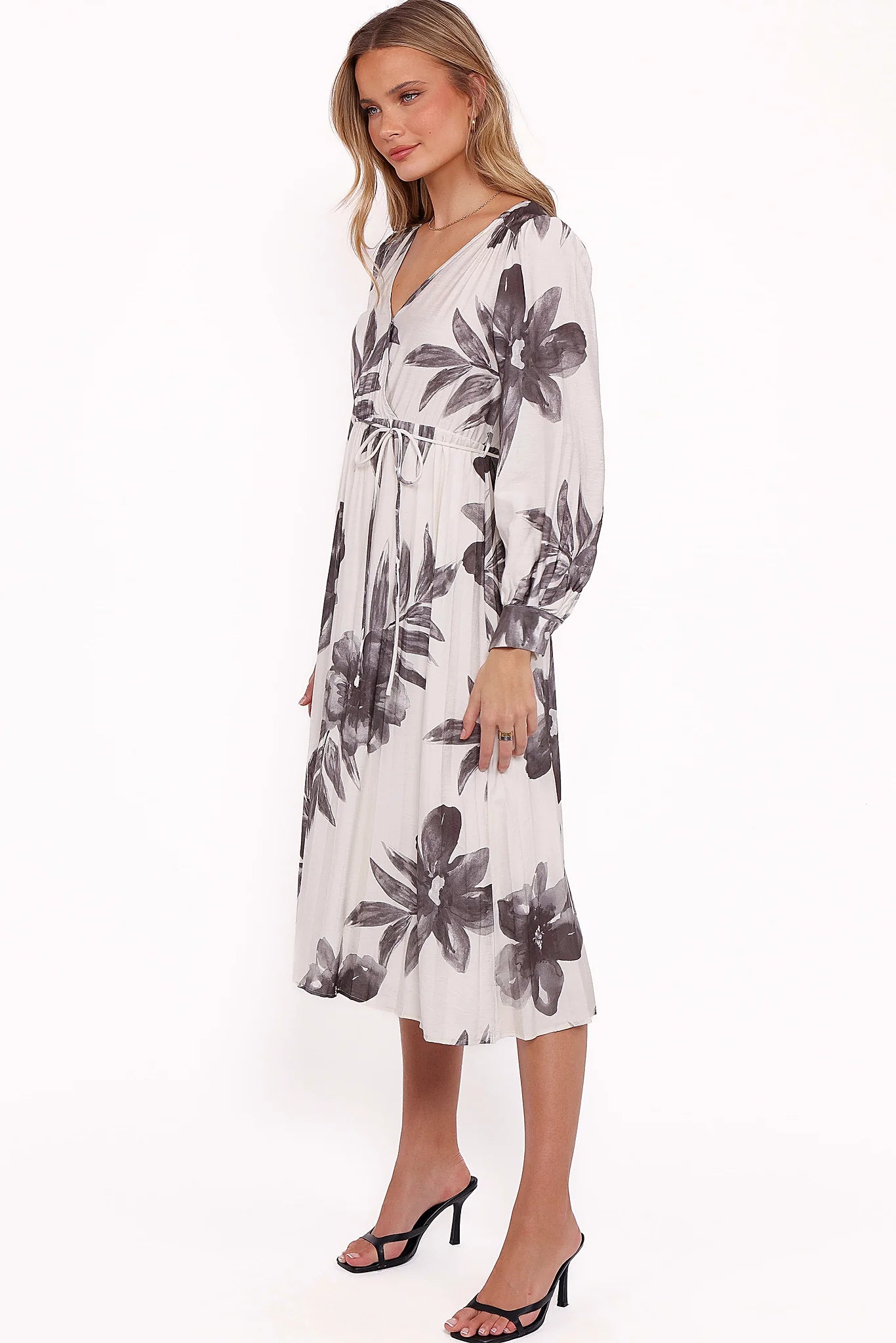 Belt loops with drawstring tie close on a floral midi dress