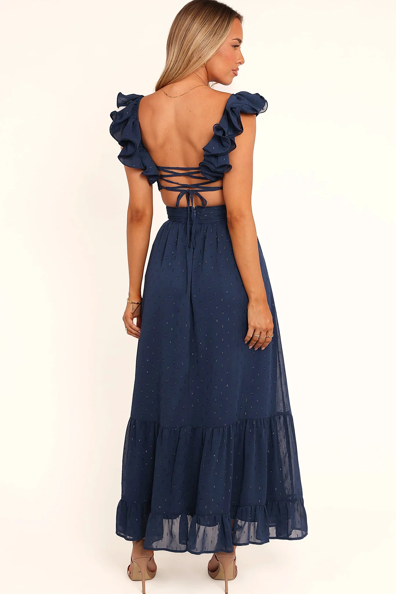 Ruffle hemline on a navy A-line maxi dress
