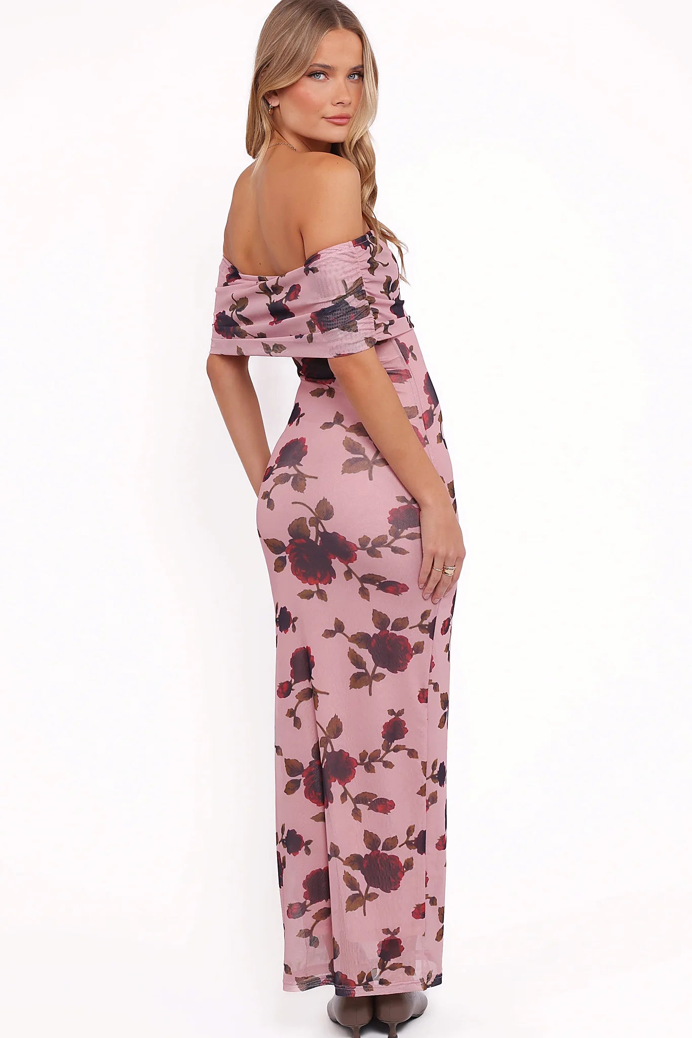 Full length view of a pink rose print bodycon maxi dress