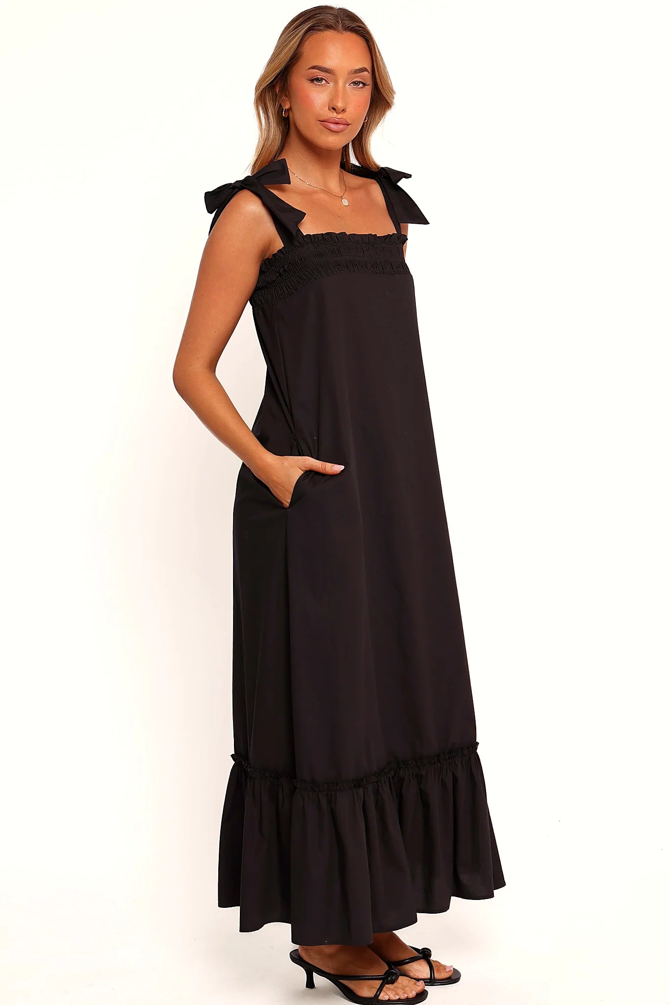 Ruffle hemline on a black maxi dress