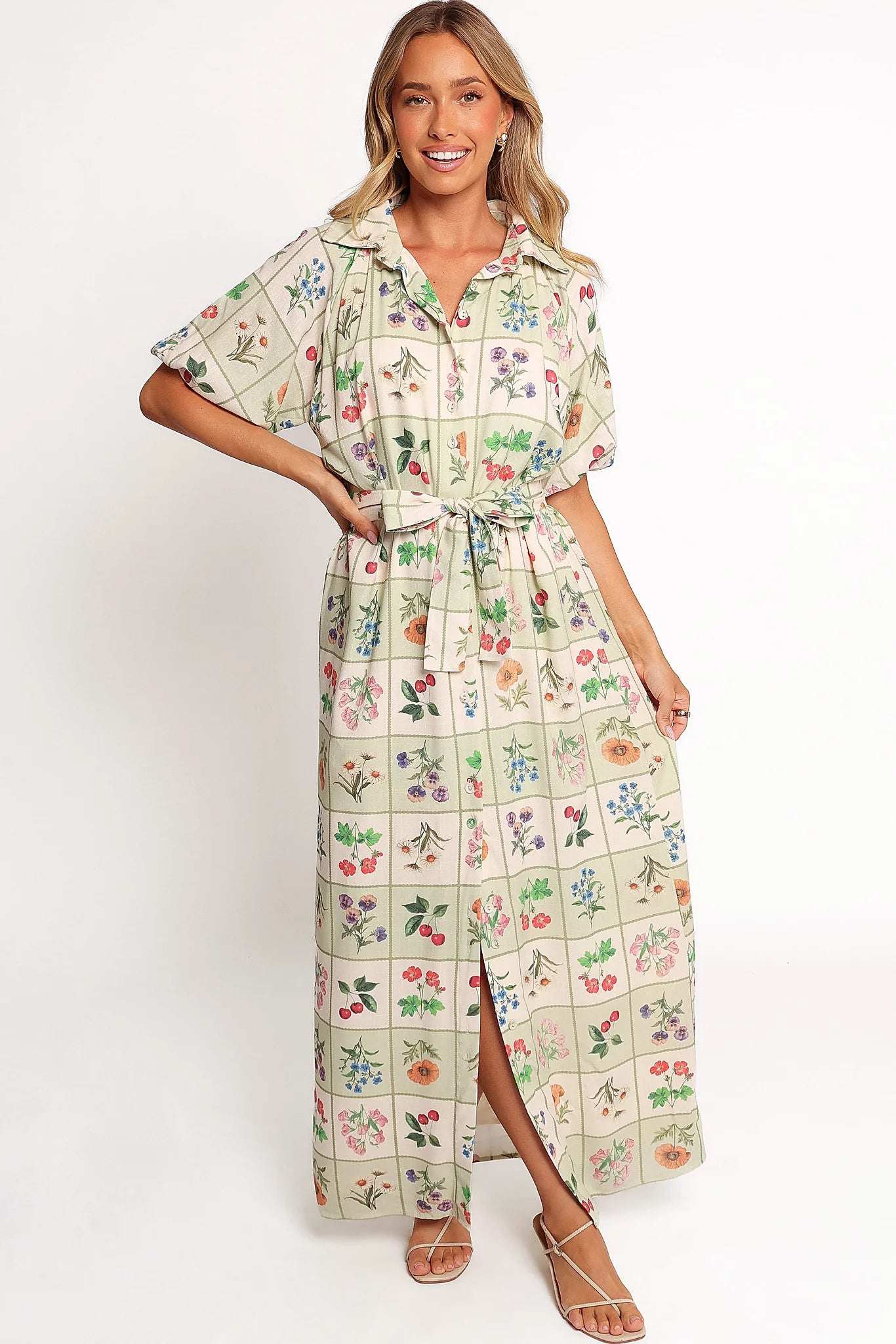 Functional buttons down the front of a floral linen maxi dress