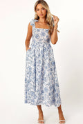 Blue floral midi dress with a square neckline and adjustable tie straps