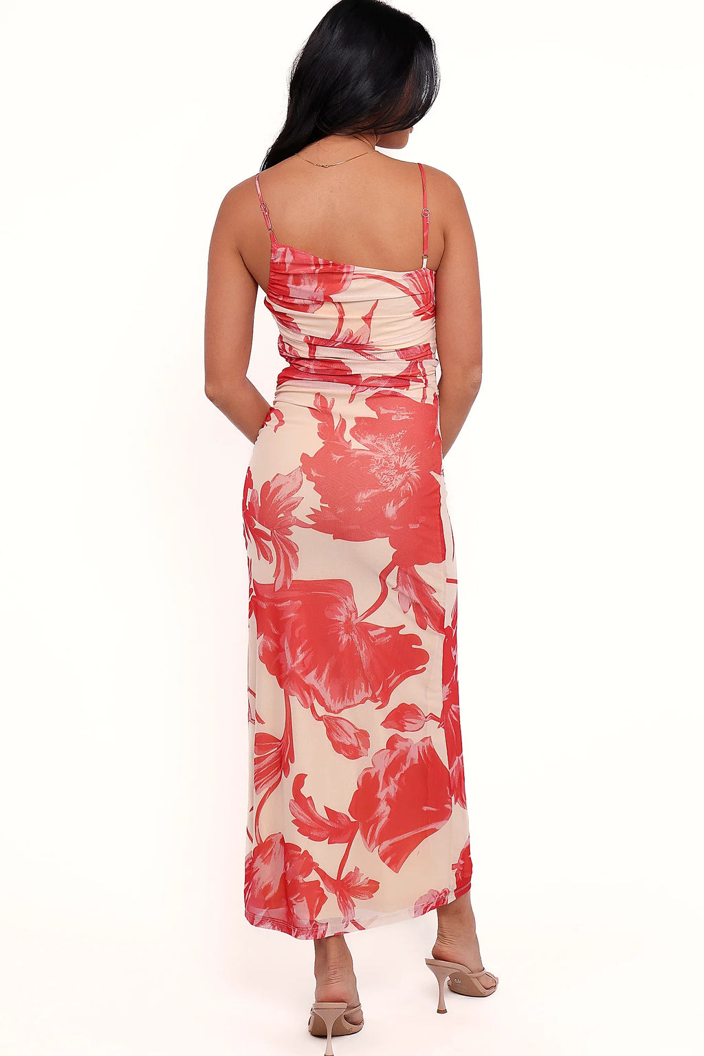 Full length view of a red floral bodycon maxi dress
