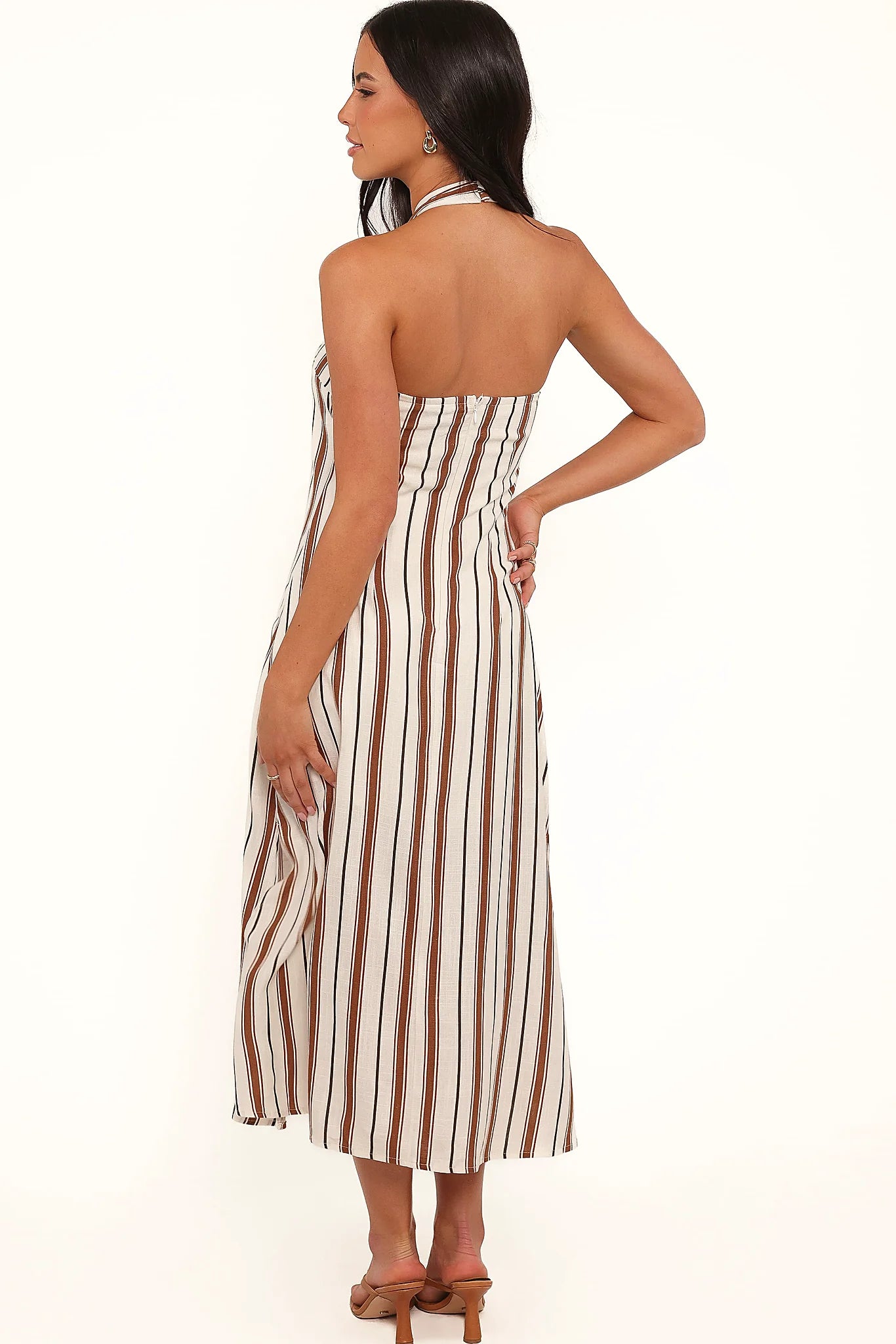 Invisible back zip on a brown striped midi dress