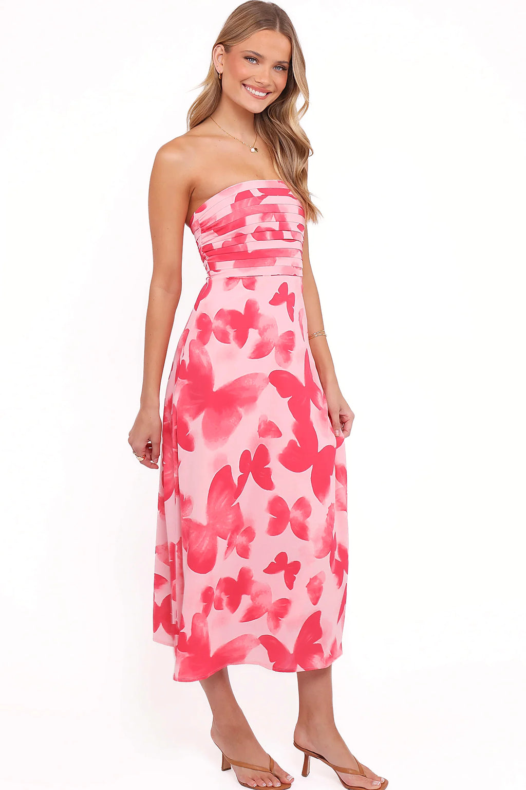 A-line skirt on a strapless butterfly print midi dress
