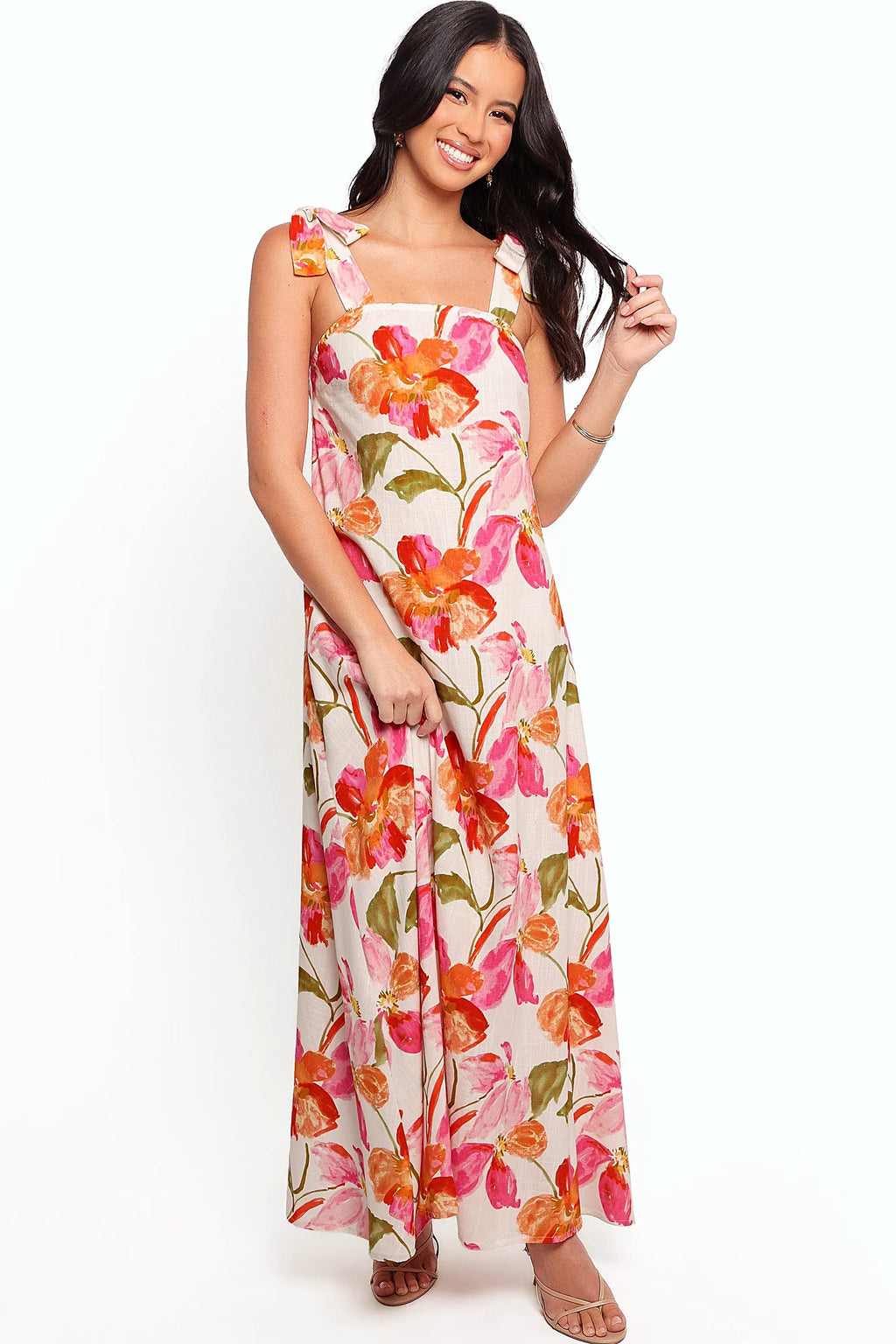 Tie close shoulder straps on a floral linen maxi dress