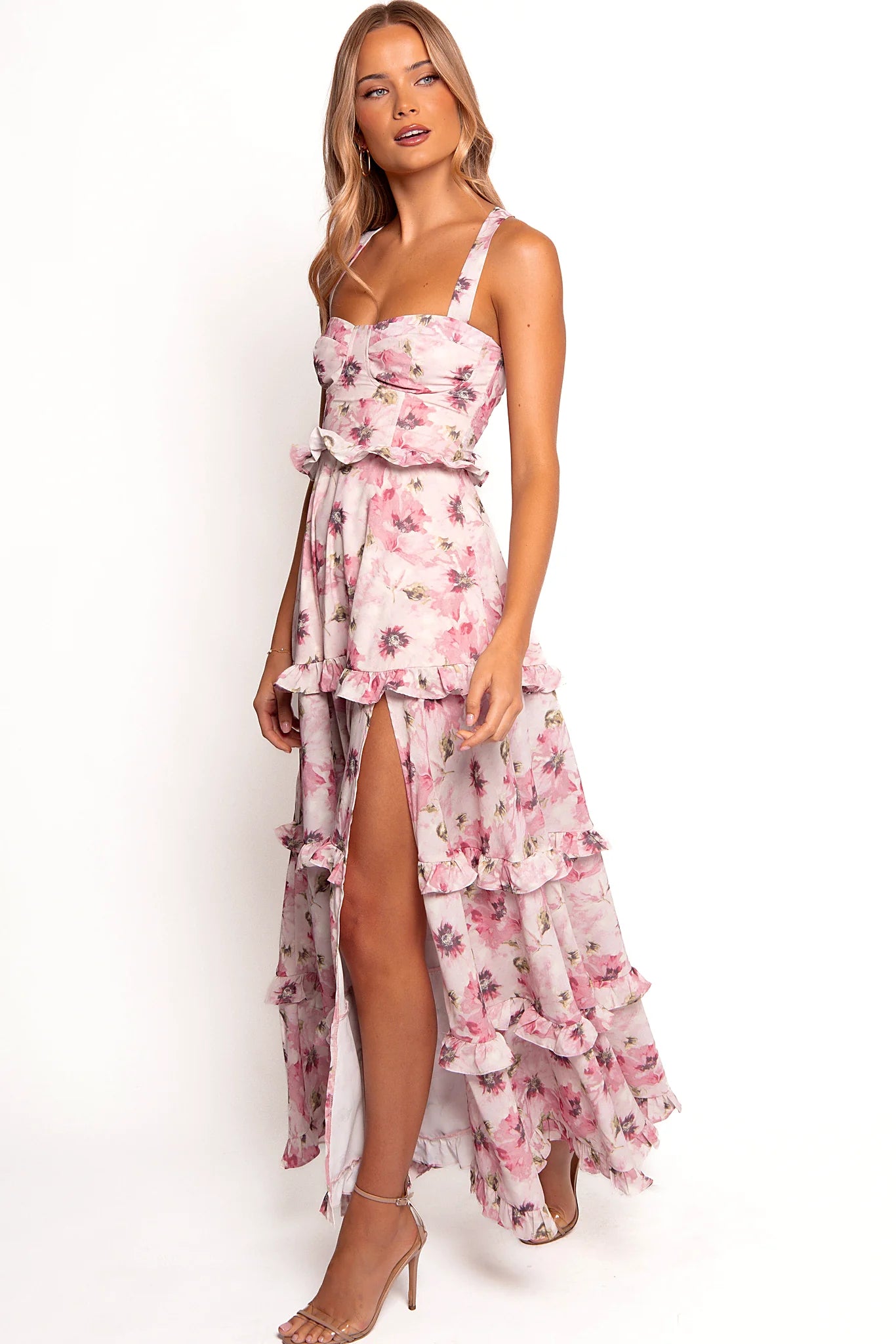 Full length view of a pink bloom tiered A-line maxi dress