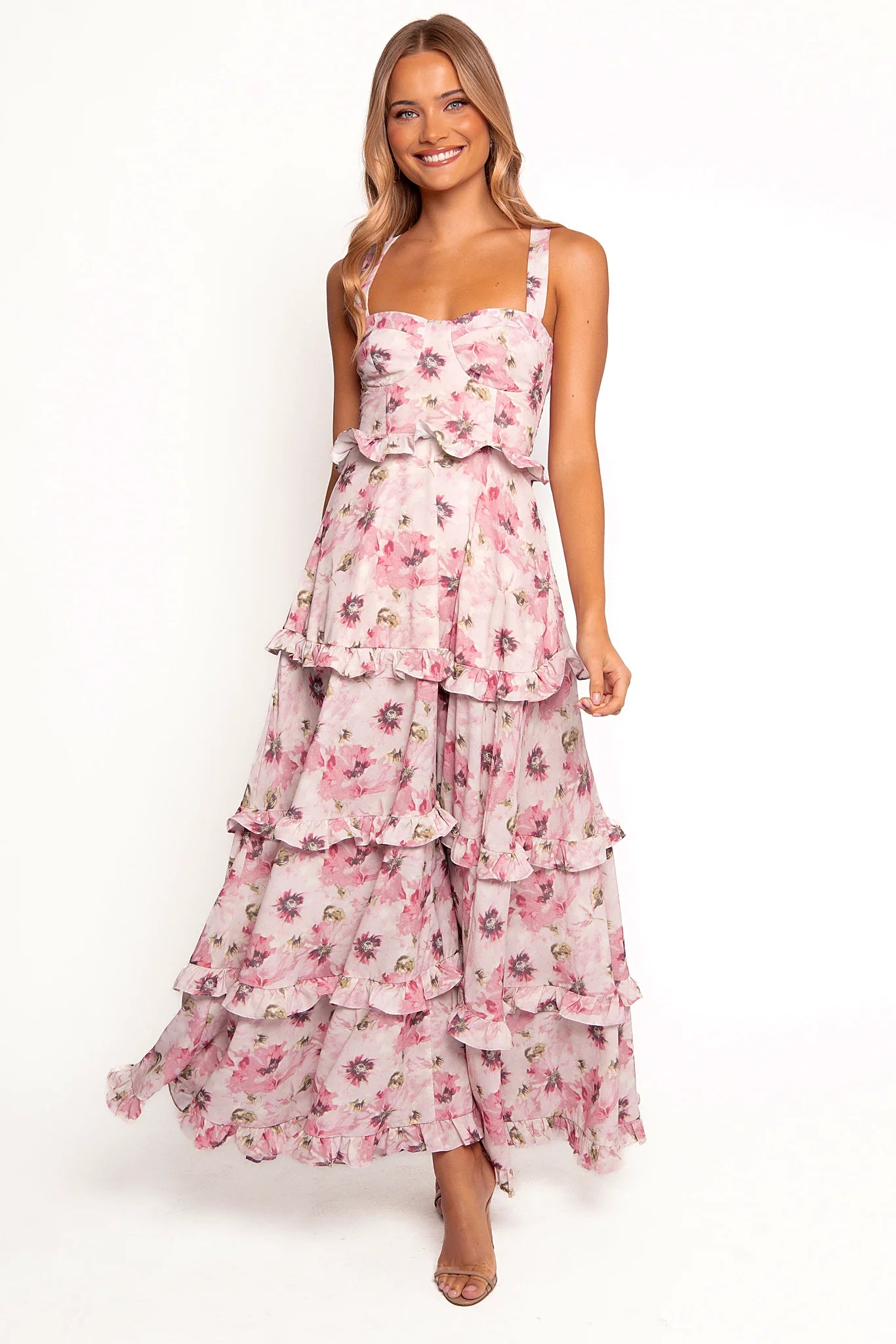 Lace up back of a pink tiered maxi dress with concealed zip closure