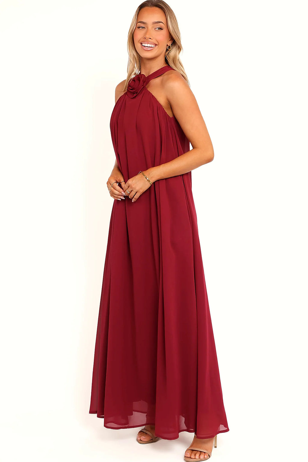 Full length view of a berry halter neck maxi dress