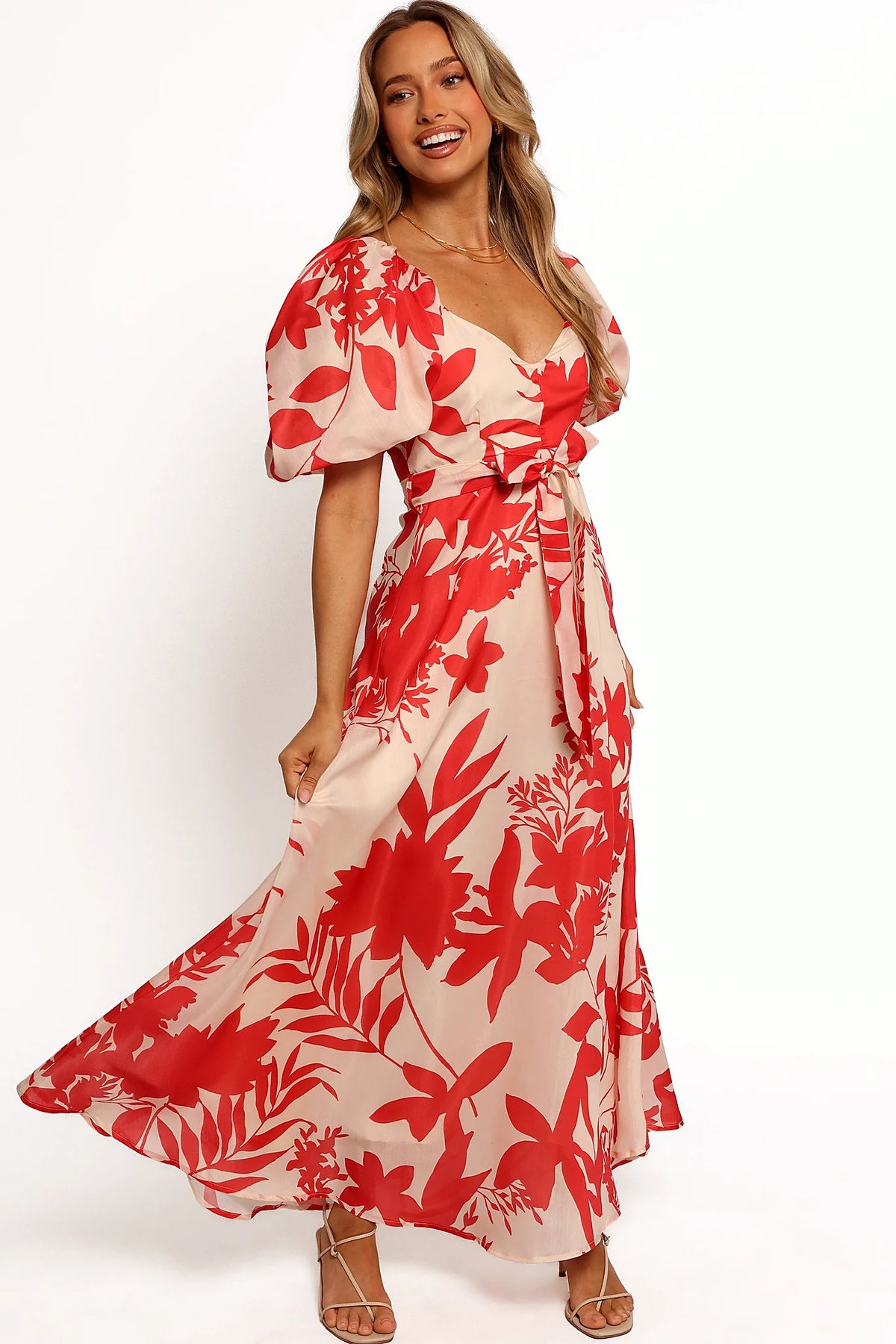 Belt loops with removable waist tie on a red floral midi dress