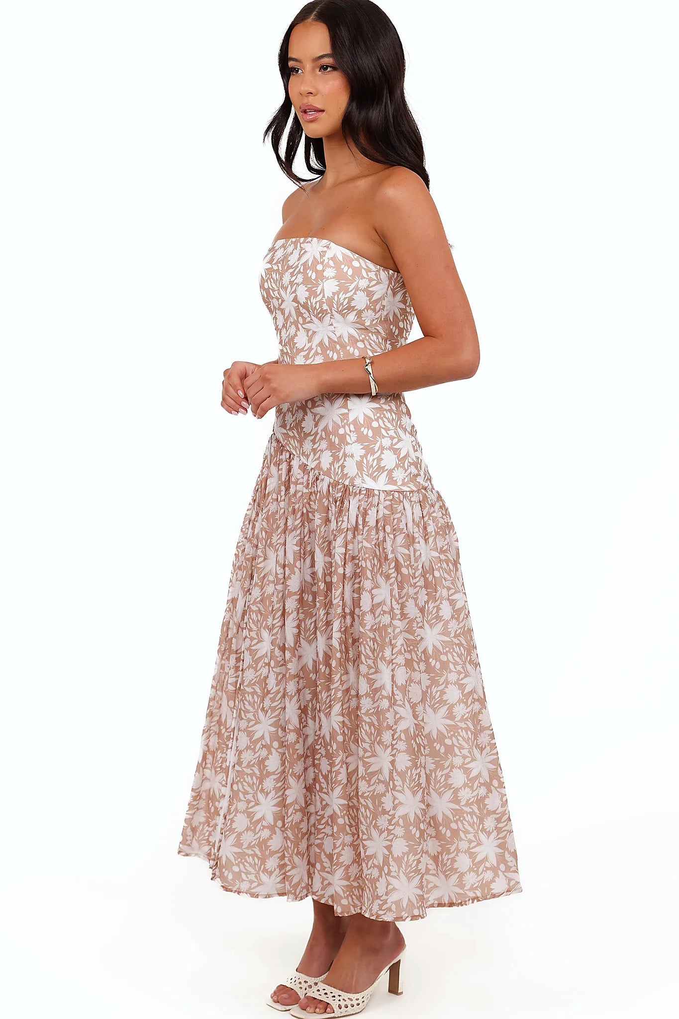 Front split detail on a brown floral maxi dress