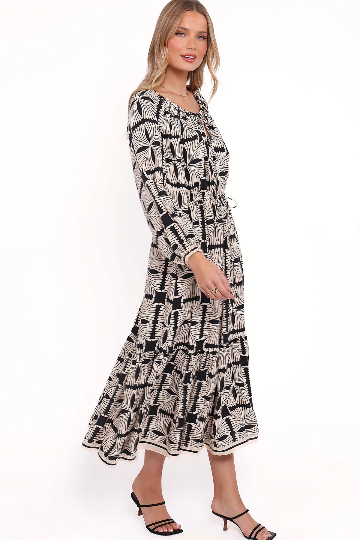 Drawstring waist tie close on an unlined black midi dress