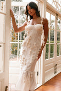 Cream midi dress with a sweetheart neckline and thin adjustable straps
