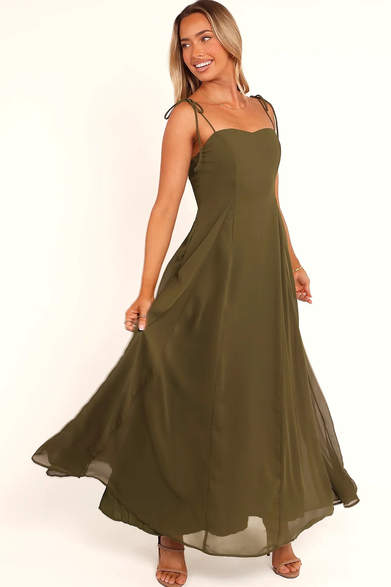 Side pocket detail on an olive maxi dress