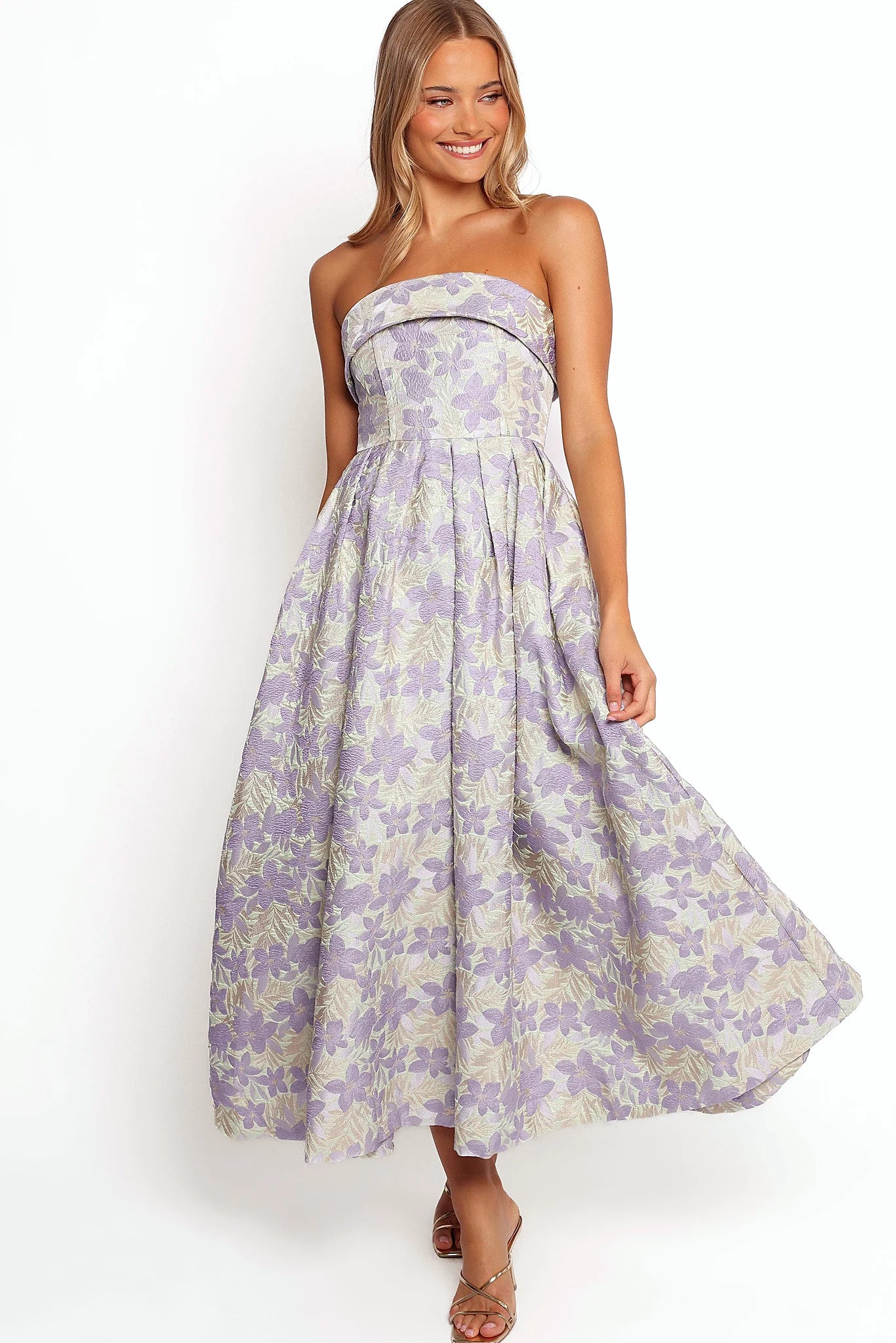 Pleated full skirt on a sage floral midi dress