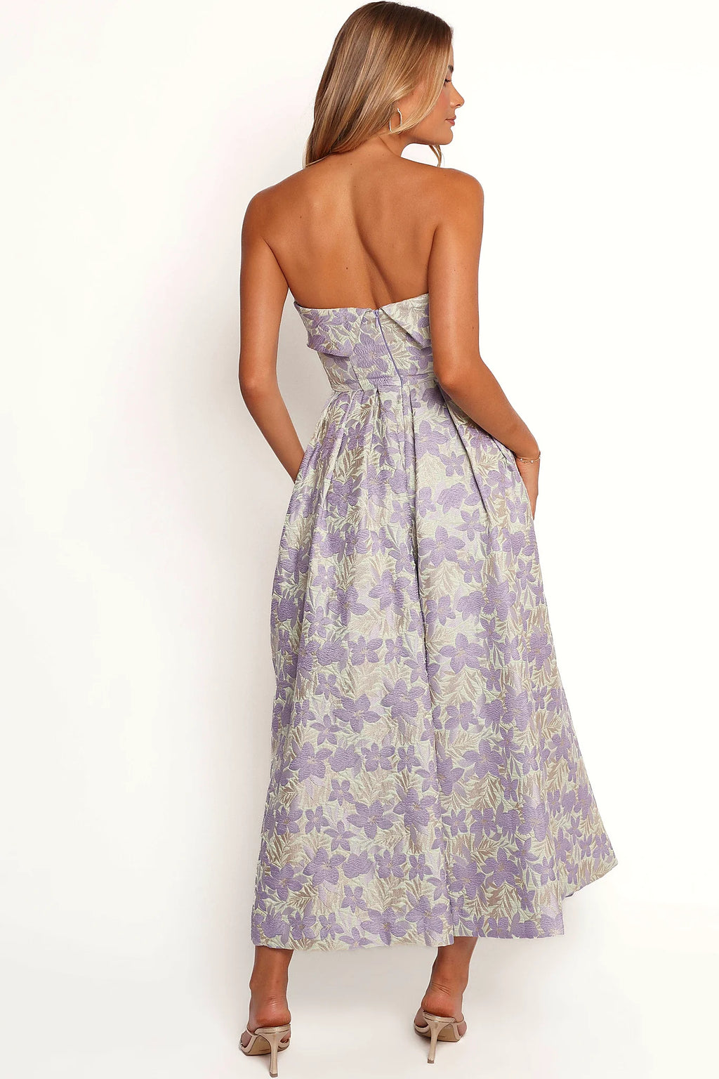 Full length view of a large floral strapless midi dress
