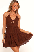 Brown halterneck mini dress with a tie close on the bust