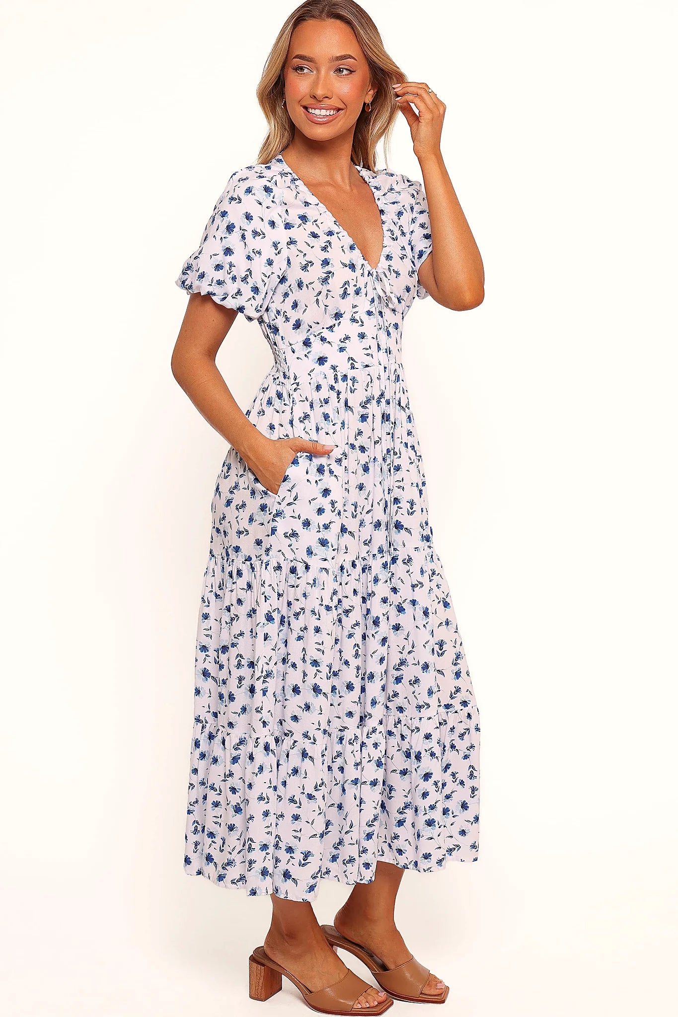 Full length view of a blue ditsy floral pull on maxi dress