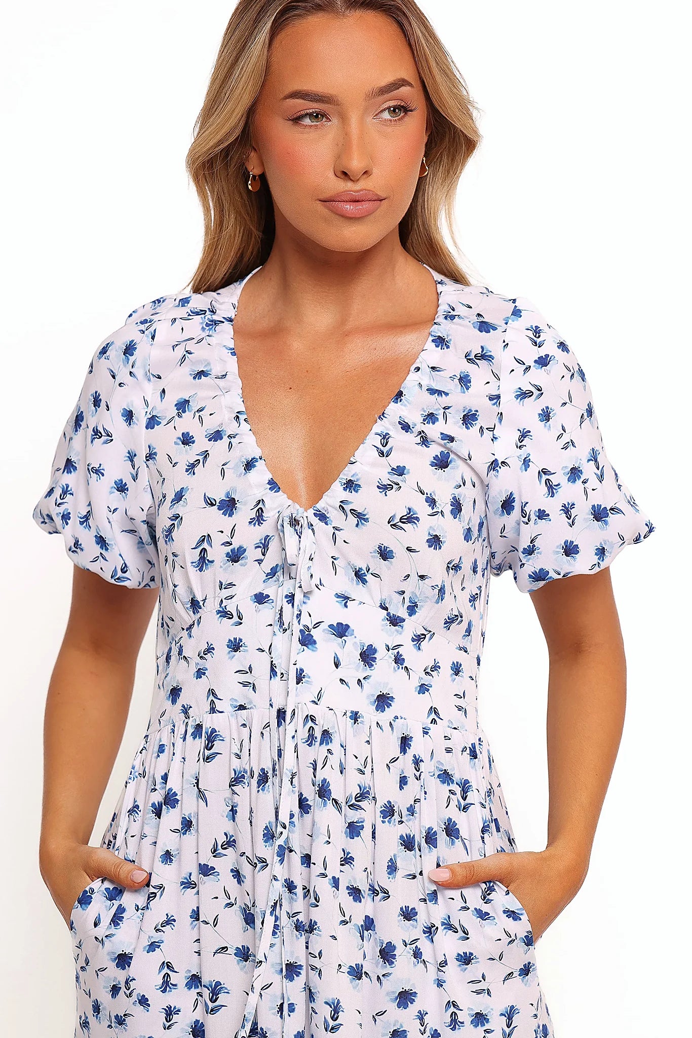 Shirred elasticised waistband at the back of a floral maxi dress