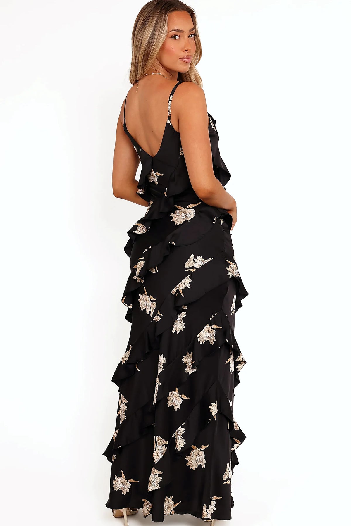 V detail at the back of a black floral maxi dress