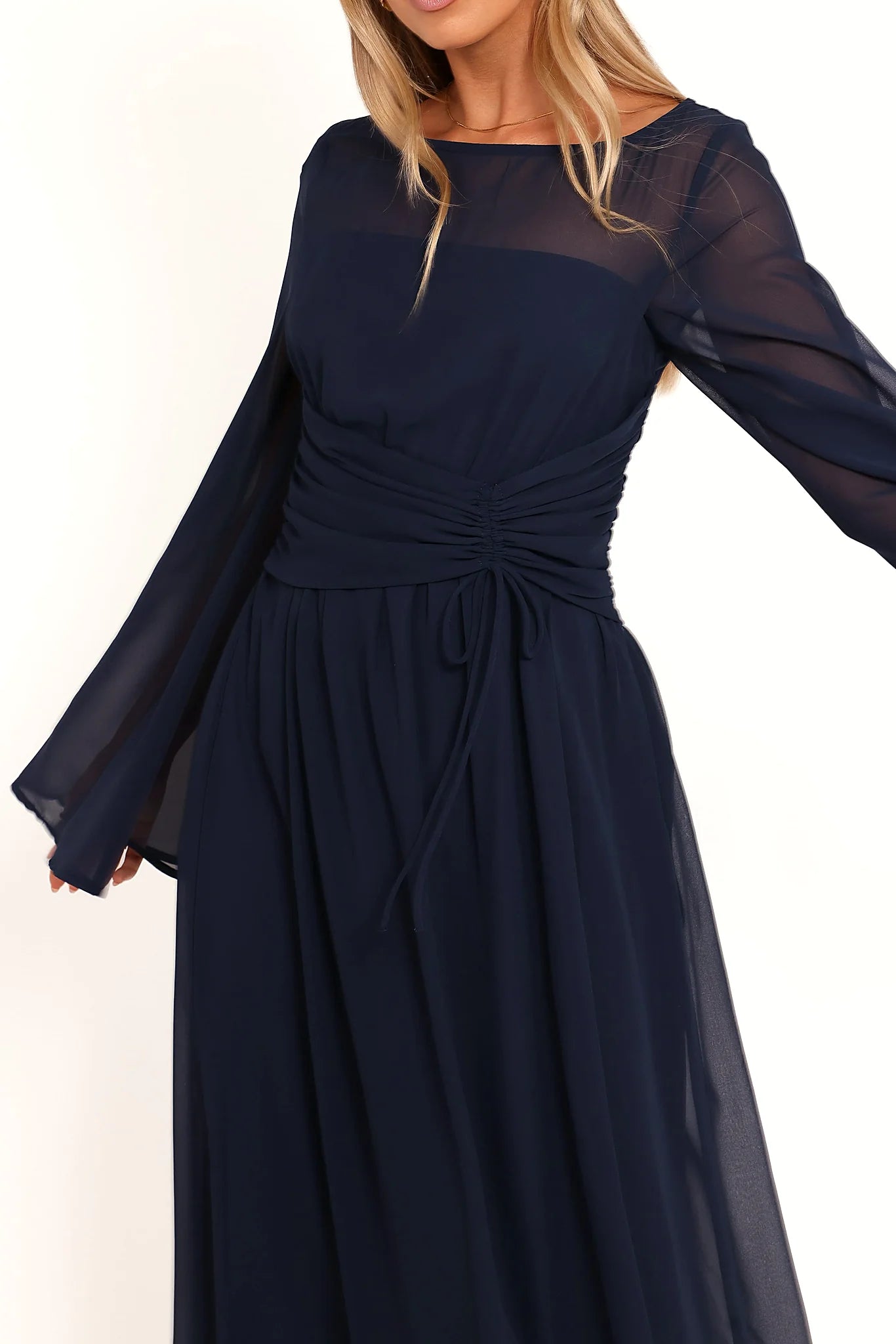 Gathered waist with drawstring detail on a navy maxi dress