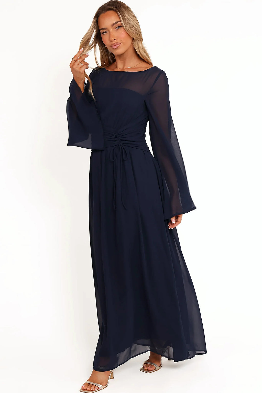 Full length view of a navy A-line maxi dress