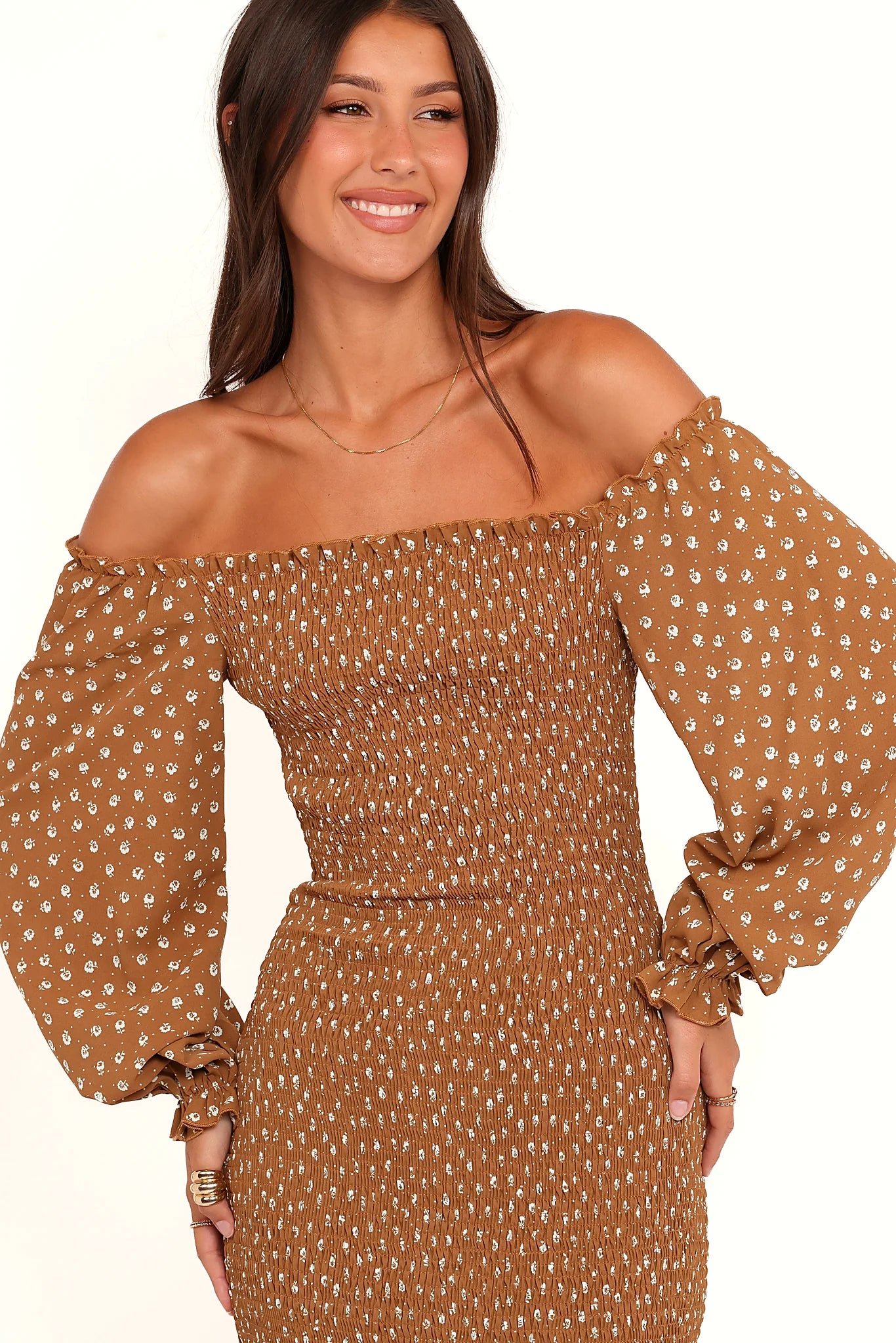 Long sleeve with elasticised cuff on a brown floral midi dress