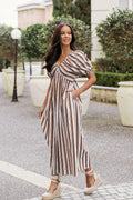 Chocolate stripe maxi dress with a V neckline and puff sleeves