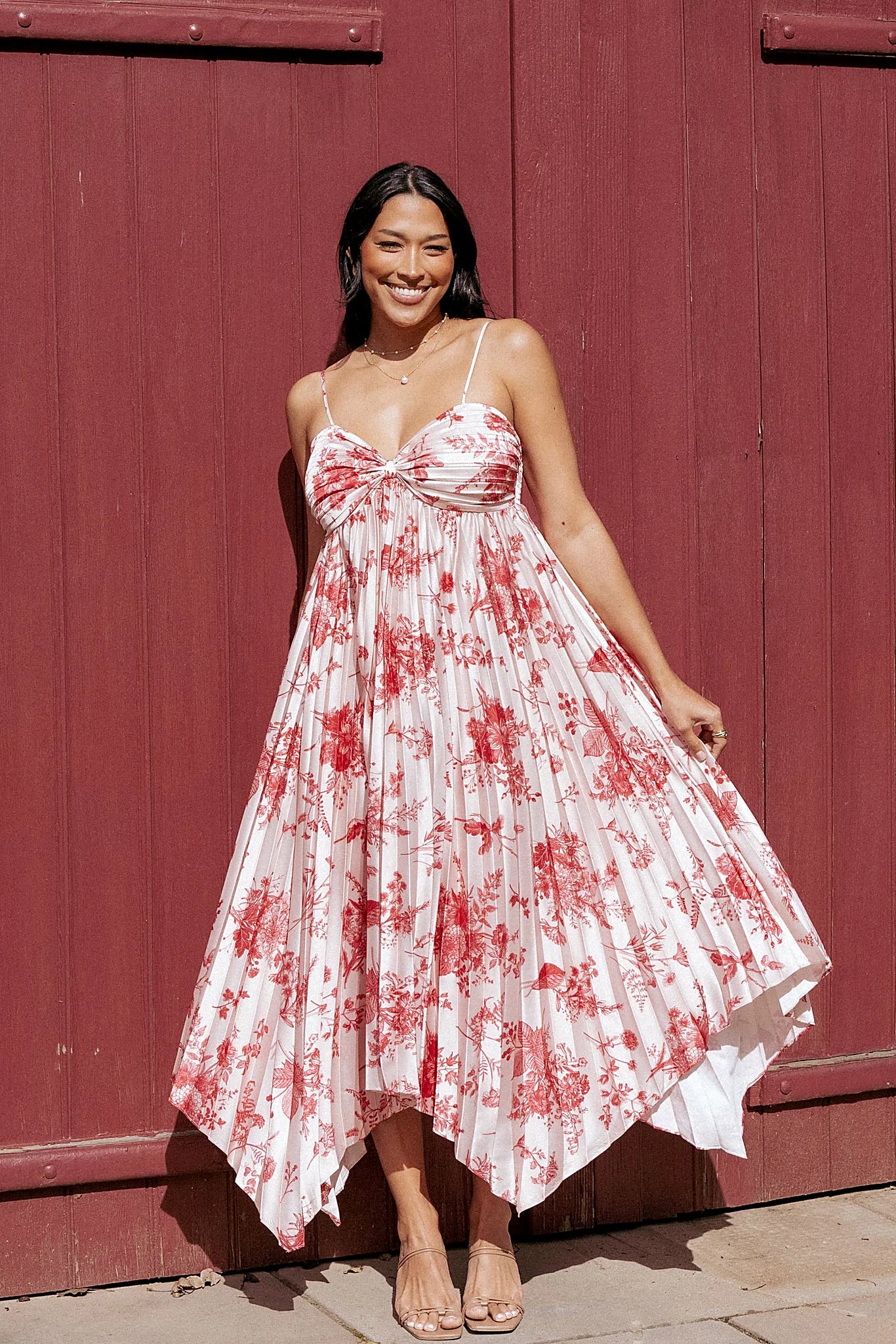 Red floral satin dress with a sweetheart neckline and thin straps