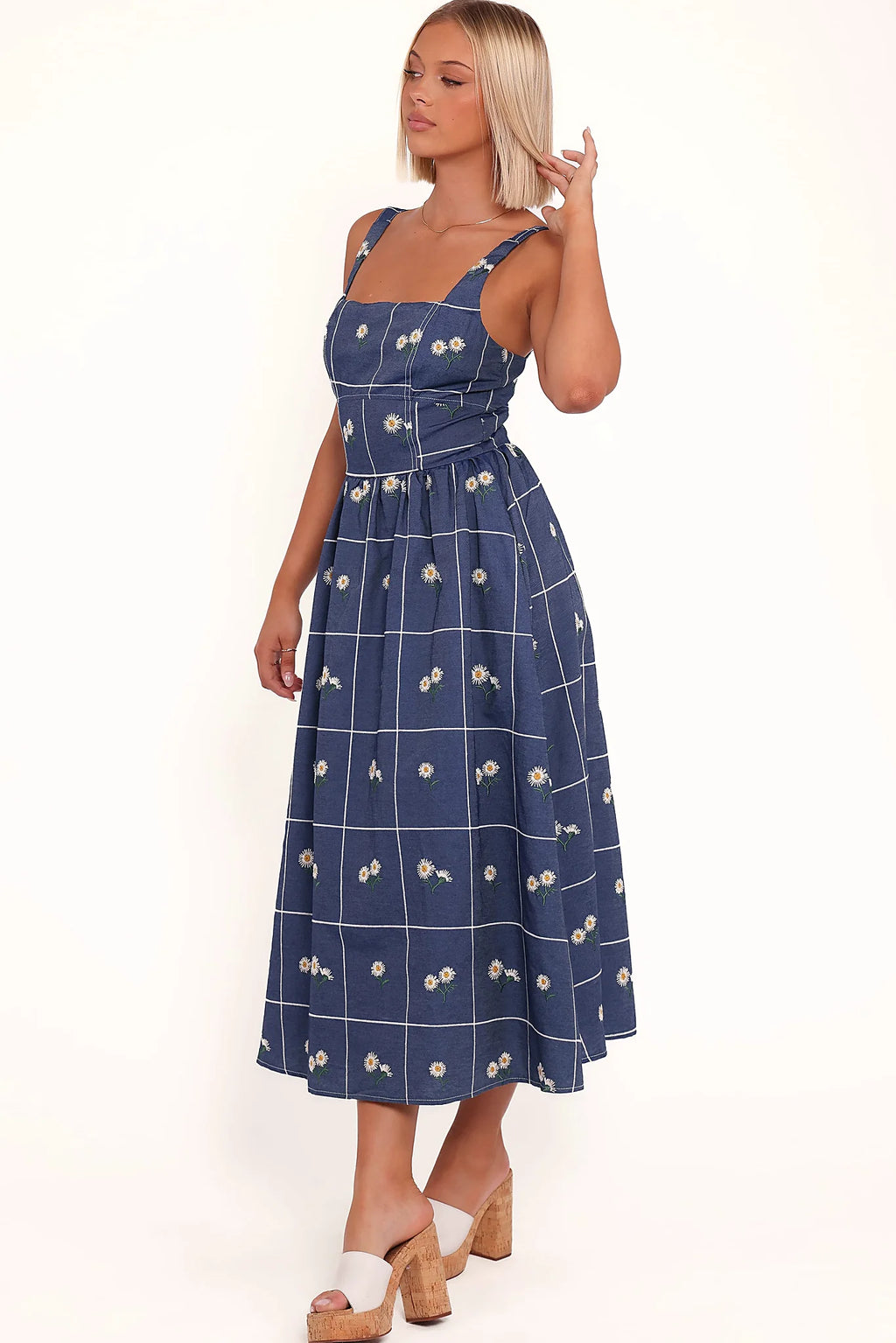 Side pocket on a blue floral A-line midi dress